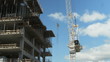 White tower crane at construction site. Timelapse.