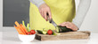 Woman cutting vegetables