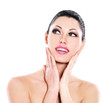 Beautiful expressive woman cares of the skin face