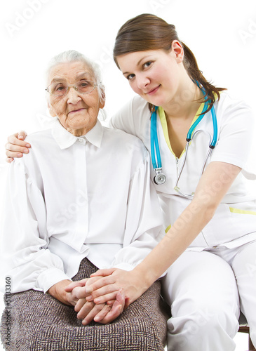 Photo: doctor taking care of an old lady doctor taking care of an old lady