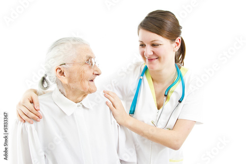 Photo: doctor taking care of an old lady doctor taking care of an old lady