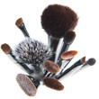 Makeup brushes on a white background