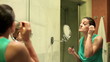 Video: Adult beautiful woman dyes her eyelashes in bathroom Adult beautiful woman dyes her eyelashes in bathroom
