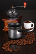 Coffee maker and coffee mill on brown table