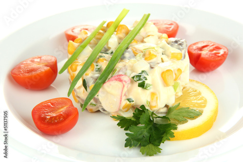 Photo: Small portion of food on big plate close up Small portion of food on big plate close up