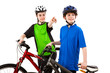 Photo: Cyclists - boy and girl isolated on white background Cyclists - boy and girl isolated on white background