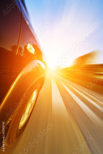 Photo: car on the road with motion blur background car on the road with motion blur background