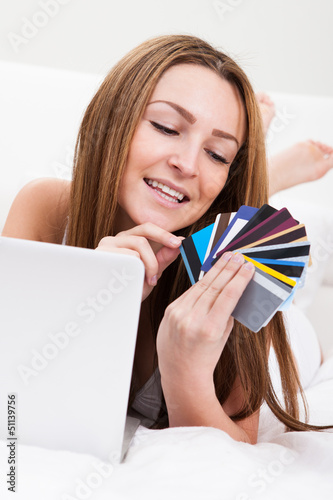 Photo: Woman Shopping With Credit Card Woman Shopping With Credit Card
