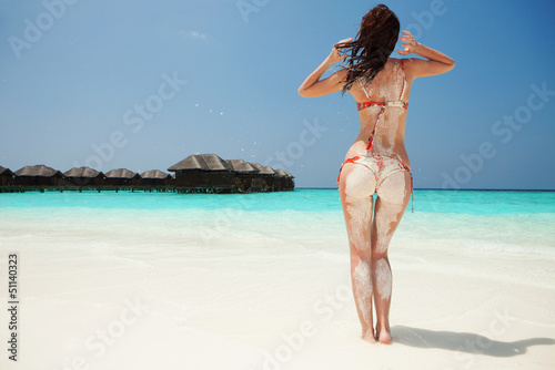 Photo: Sexy woman relax on the summer beach Sexy woman relax on the summer beach