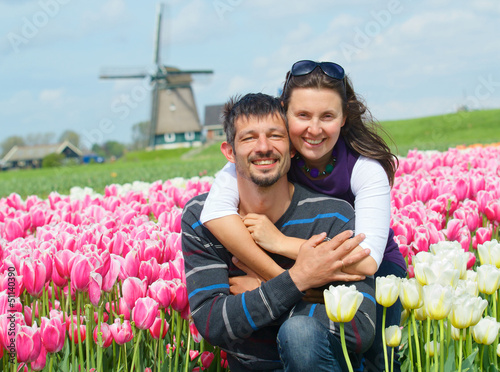 Photo: Young couple in the tulip field Young couple in the tulip field