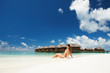 Cute woman relaxing on the tropical beach