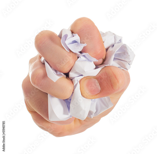 Photo: Close-up Of Hand Squeezing Paper Close-up Of Hand Squeezing Paper