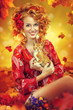Autumn Woman Fashion Portrait. Fall. Beautiful Girl.