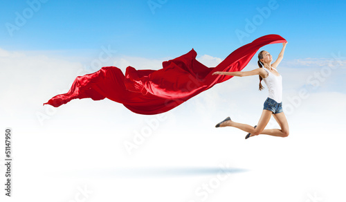 Photo: Modern style dancer against blue sky Modern style dancer against blue sky