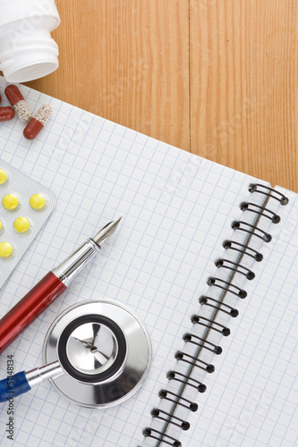 Photo: medical stethoscope with pills medical stethoscope with pills