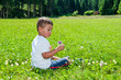 baby sat on the lawn