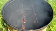 fish hang smoke in smokehouse rusty barrel