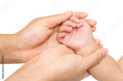 Photo: baby massage,Mother hand massaging hand of her baby baby massage,Mother hand massaging hand of her baby