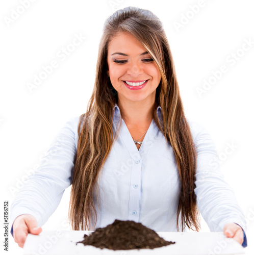 Photo: Business woman with soil Business woman with soil
