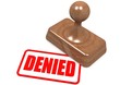 Denied word on wooden stamp
