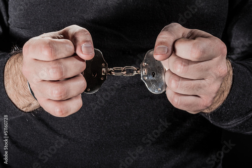 Photo: Handcuffed Handcuffed