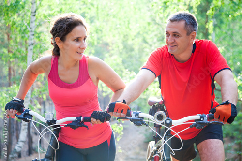 Photo: mature couple on bicycle mature couple on bicycle