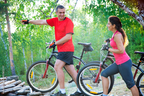 Photo: mature couple on bicycle mature couple on bicycle
