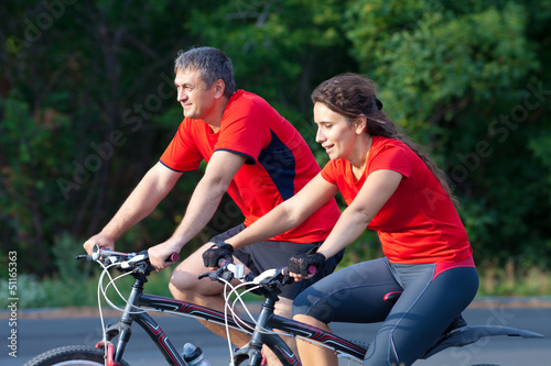 Photo: mature couple on bicycle mature couple on bicycle