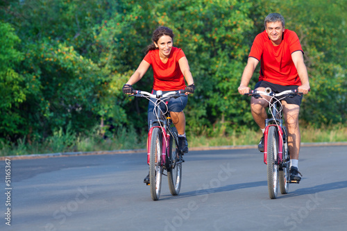 Photo: mature couple on bicycle mature couple on bicycle