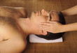 Man getting a face massage at spa