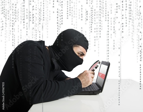 Photo: Hacker and password Hacker and password