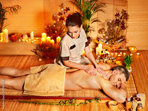 Photo: Woman getting bamboo massage. Woman getting bamboo massage.