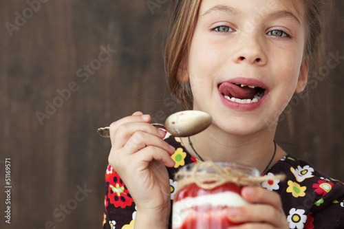 Photo: Child eating dessert Child eating dessert