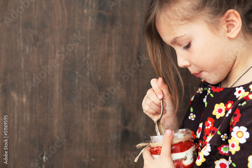 Photo: Child eating dessert Child eating dessert