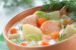 Salmon soup with cream,  carrots