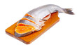 Salmon sliced on  cutting board, isolated on white background