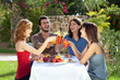Two couples celebrating