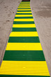 A plastic beach boardwalk on the sand