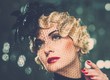 Elegant blond retro woman with red lipstick 