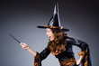 Witch in scary halloween concept