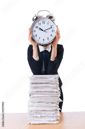 Photo: Woman businesswoman with giant alarm clock Woman businesswoman with giant alarm clock