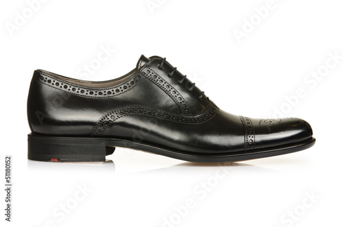 Photo: Fashion concept with male shoes on white Fashion concept with male shoes on white