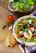Fresh lidht salad with poached egg