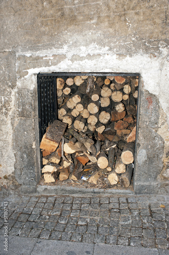 Photo: A small storage closet with firewood A small storage closet with firewood