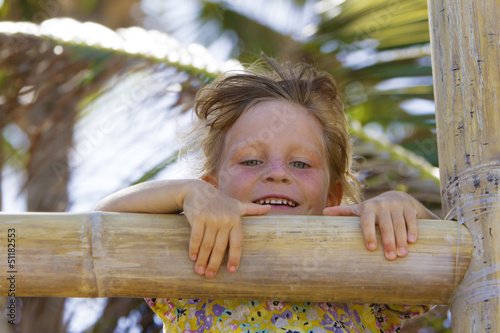Photo: young happy smiling child girl enjoying summer outdoor portrait young happy smiling child girl enjoying summer outdoor portrait