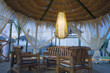 An exotic sitting spot on the beach at night
