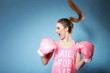 Photo: Female boxer model with big fun pink gloves Female boxer model with big fun pink gloves