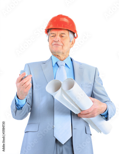 Photo: Engineer at the age of. Isolated Engineer at the age of. Isolated