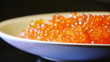 Video: Red caviar on a white plate Red caviar on a white plate