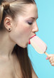 Foto: Young woman with ice cream Young woman with ice cream